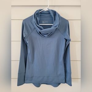 Women's Reebok cowel neck pullover sweatshirt in blue. Size Medium